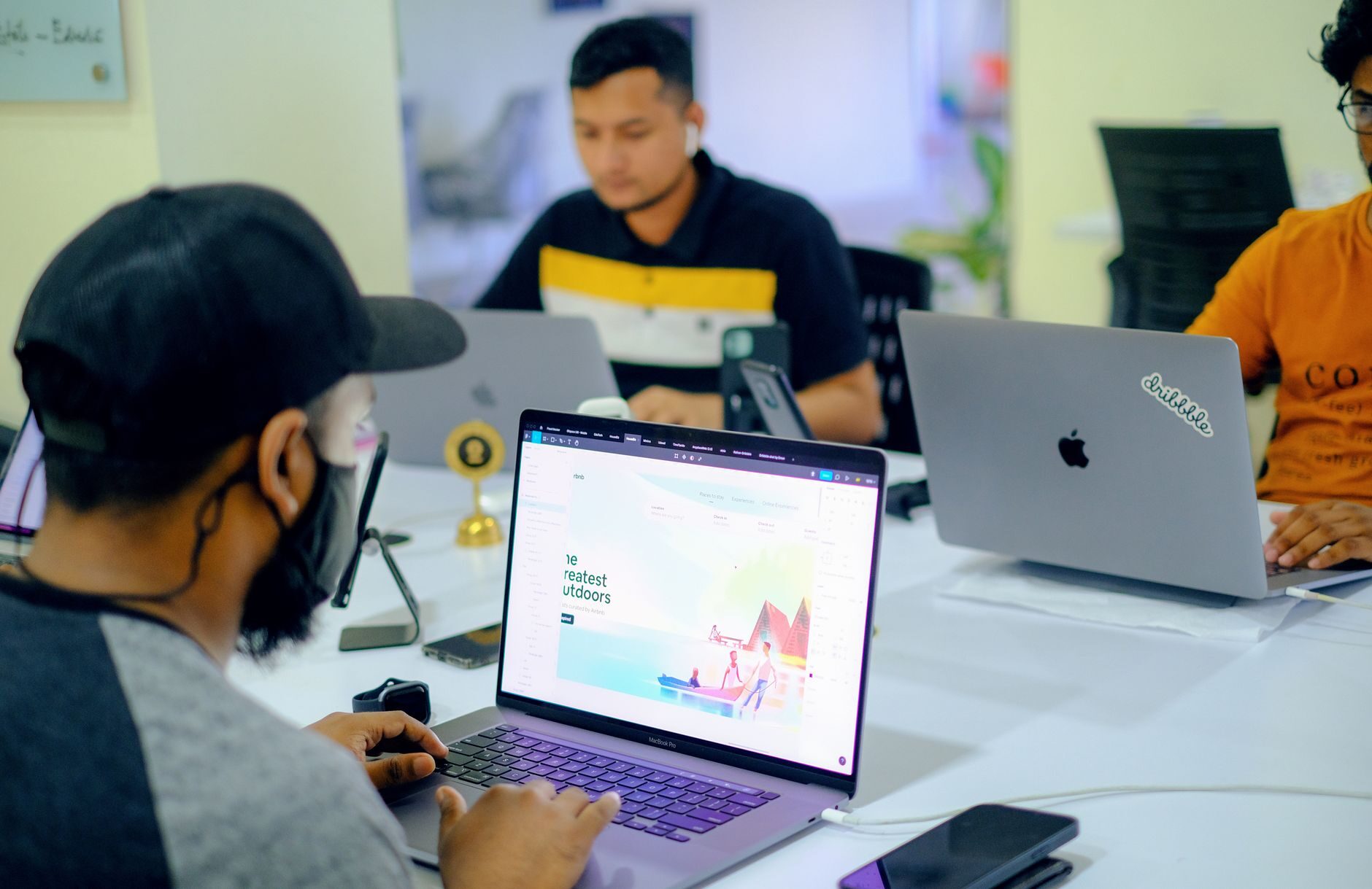 Lafayette WordPress, hosting and SEO team working on laptops in an office